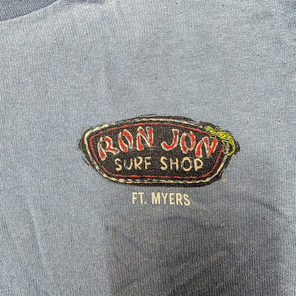 Vintage 90sRon Jon Surf Shop Blue T-Shirt (Ft. Meyers).